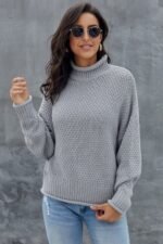 Stylischer Langarm Rollkragenpullover in Grau mit Batwing Ärmeln